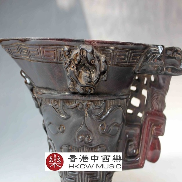 精雕瑞獸牛角杯