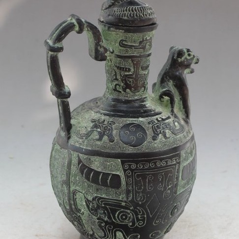 精雕獸頭 酒壺 